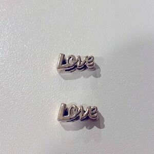 Pandora sterling silver “Love” charms